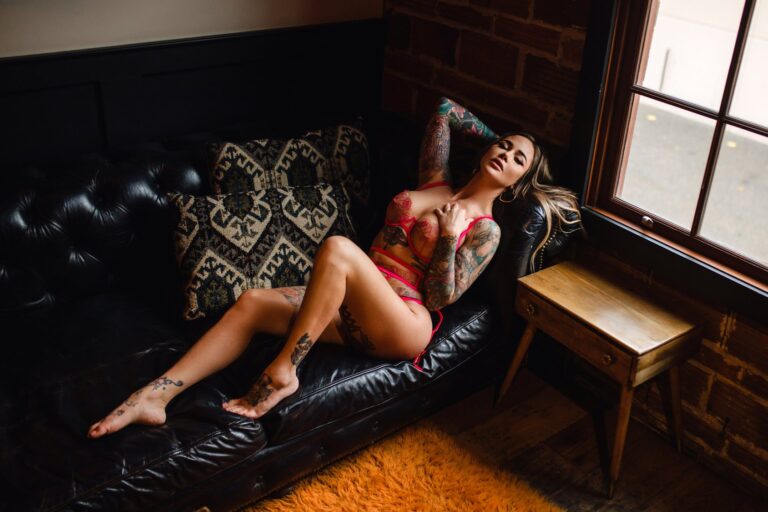 jessica wilde BNA lingerie leather couch